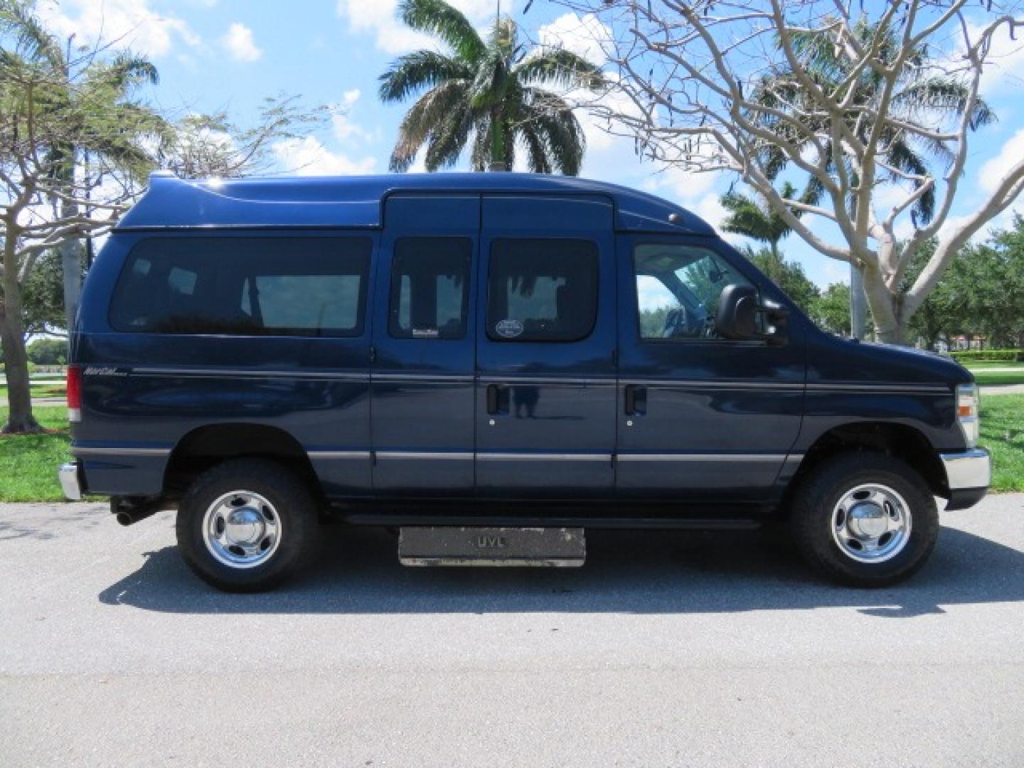 2011 Dark Blue /Gray Ford E-Series Wagon E-350 XLT Super Duty (1FBNE3BS4BD) with an 6.8L V10 SOHC 20V engine, located at 4301 Oak Circle #19, Boca Raton, FL, 33431, (954) 561-2499, 26.388861, -80.084038 - You are looking at a Gorgeous 2011 Ford Econoline E350 XLT Norcal Max High Top Handicap Wheelchair Conversion Van with 6.8L V10, 15K Original Miles, 9 Inch Lowered Floor, Braun UVL Side Entry Wheelchair Lift, Remote Control Power Side Entry Doors, Expanded Side Entry Doors, Q Straint Tie Down, Syste - Photo#26